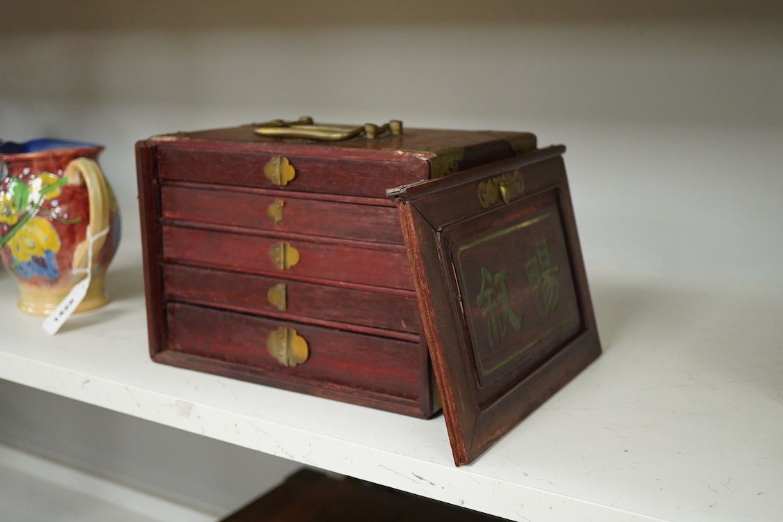 An early 20th century Chinese cased mah jong set, 20cm wide x 17cm high